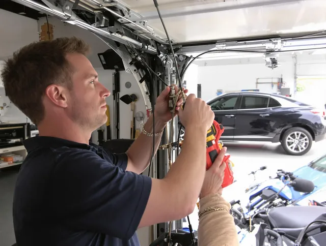 Miramar Garage Door Repair safety certified technician performing cable replacement in Miramar